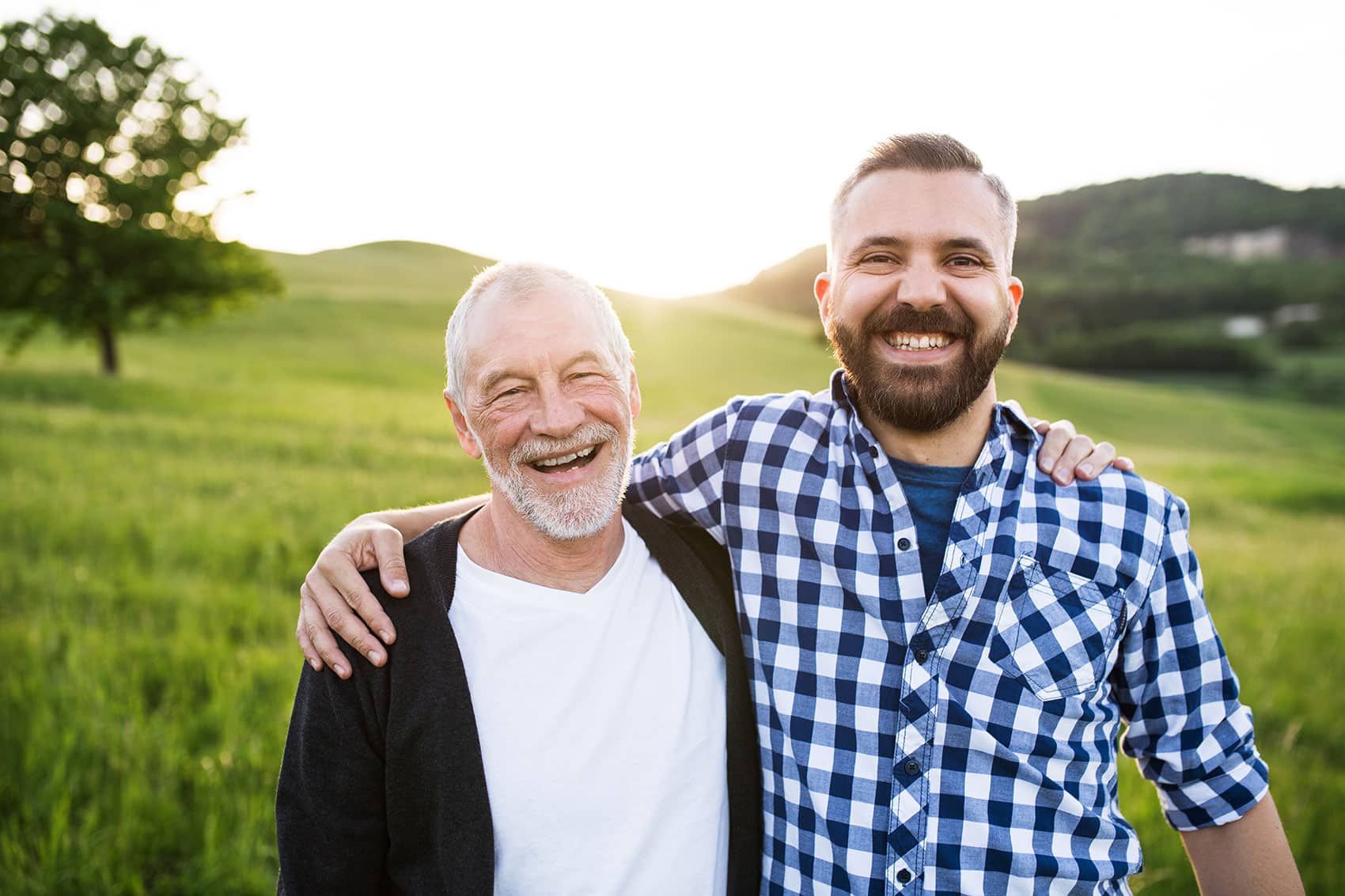 smiling father and son