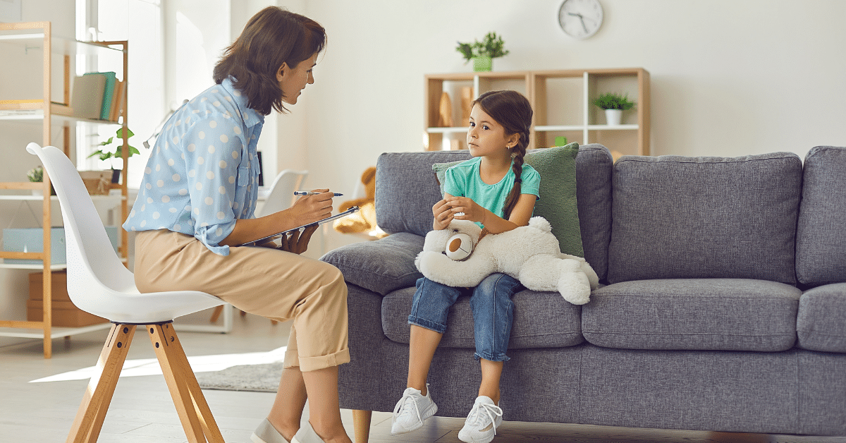 Child psychiatrist working with a young girl