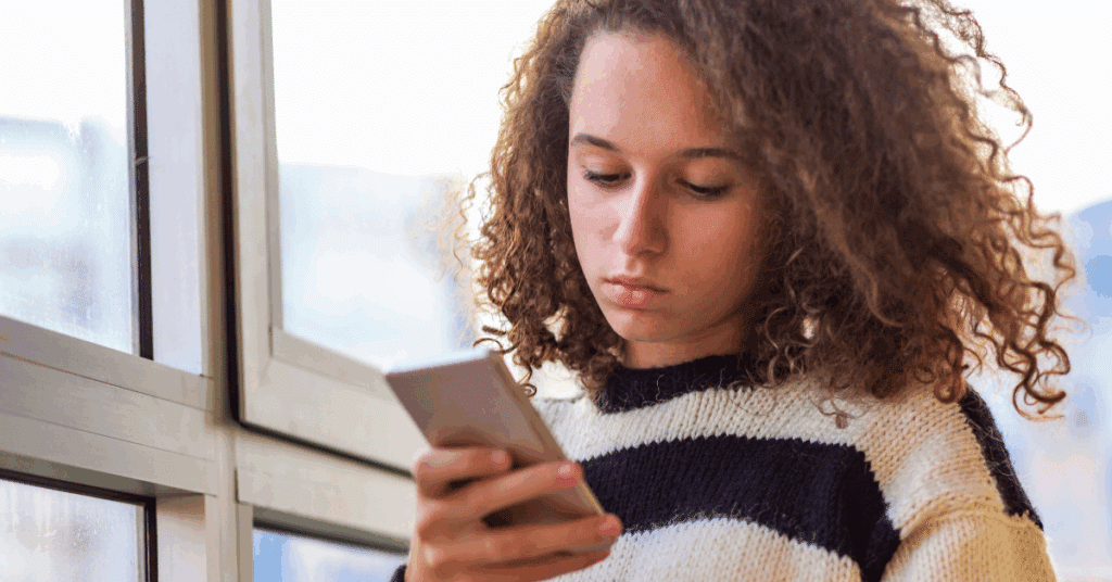 Young teenage girl on her cell phone